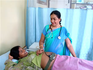Gynaecologist Dr Aarathi Hebbar with a patient